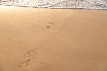 beach, wave and footsteps
