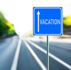 Vacation Road Sign on a Speedy Background