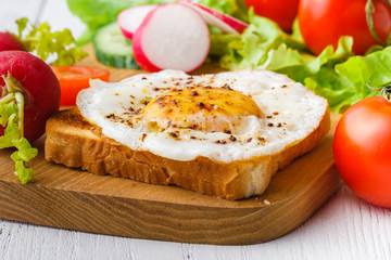 Fototapeta na wymiar typical high-calorie breakfast with toast
