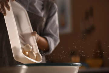 Woman preparing tasty cheese