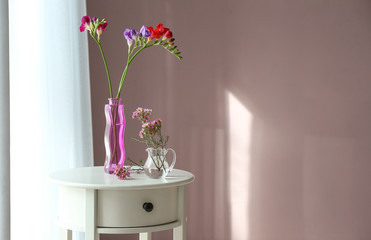 Beautiful flowers on table in room
