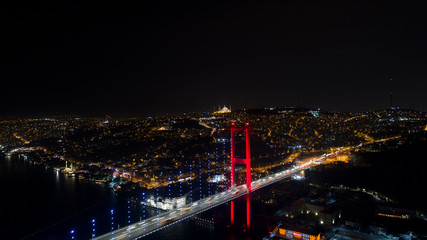 Aerial View of Istanbul Bosphorus Bridge at night. 15th July Martyrs Bridge - 15 Temmuz Sehitler Koprusu In Istanbul Turkey