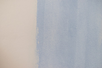 Blue paint swatch on white wall