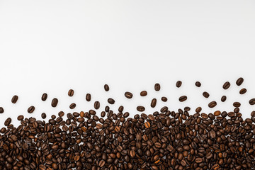 Coffee beans on white background with copy space for text