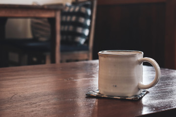 coffee cup on wooden table