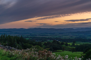 View over Greenfell Raise from Hartside Top on the A686 between Alston and Melmerby, Cumbria, England, UK - with the Lake District in the foggy background