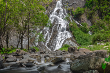 Fototapeta na wymiar Tao Dam waterfall, the beautiful waterfall in deep forest at Klong Wang Chao national park ,Kamphaeng Phet, Thailand