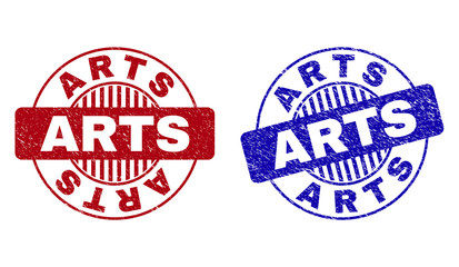 Grunge ARTS round stamp seals isolated on a white background. Round seals with grunge texture in red and blue colors. Vector rubber imitation of ARTS title inside circle form with stripes.