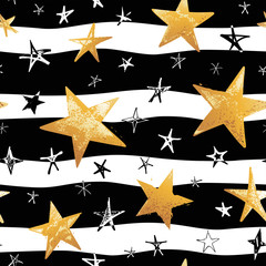 Seamless striped pattern with black and gold hand drawn vector stars in doodle style isolated on white background. 