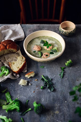 Obraz na płótnie Canvas Broccoli cream soup with salmon dumplings.selective focus