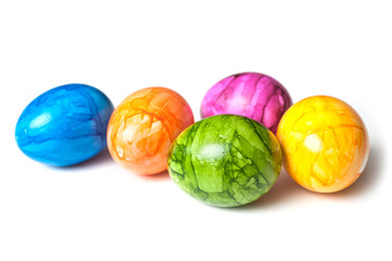 closeup of decorative painted easter eggs on white background