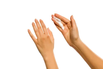 Poster closeup of female hands applying hand cream on white background © vladimirfloyd