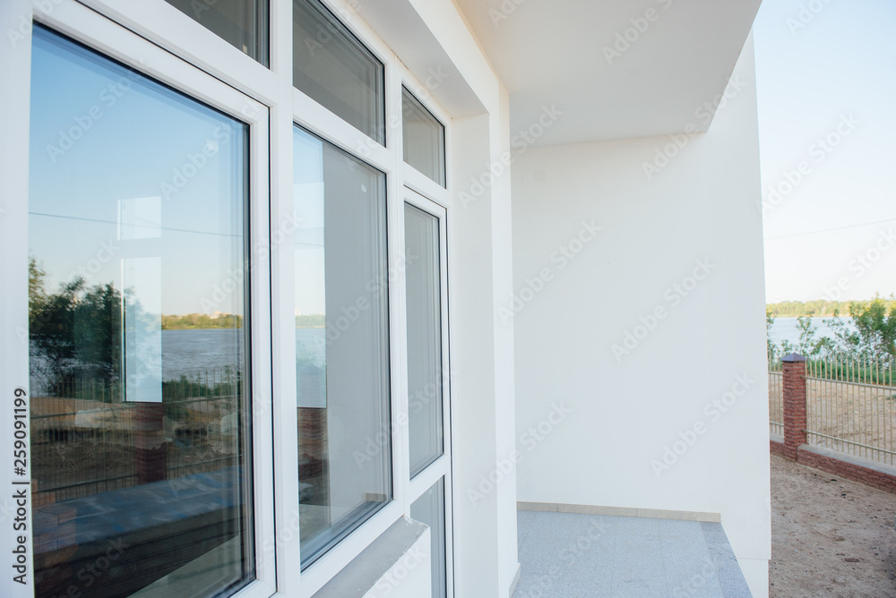 Wall mural large windows in the cottage