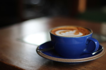 cup of coffee on black background