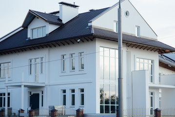 Large two-storey white country house