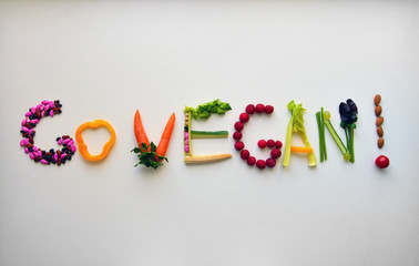 # Go Vegan written with vegetables and fruits