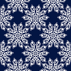 Floral seamless pattern. White flower decorations on dark blue background