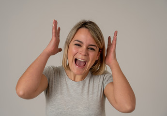 Portrait of surprised and happy woman celebrating victory and winning lottery in human emotions