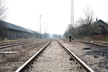 Fototapeta na wymiar Photo of abandoned rails and a railway station