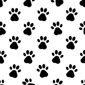 Dog paw print vector seamless pattern or background