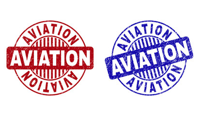 Grunge AVIATION round stamp seals isolated on a white background. Round seals with grunge texture in red and blue colors. Vector rubber imprint of AVIATION text inside circle form with stripes.