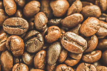 Roasted coffee beans closeup texture background