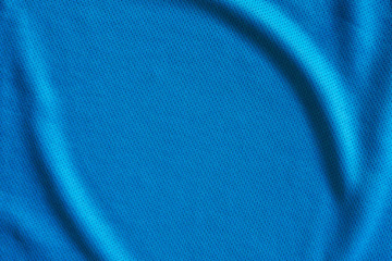 Blue fabric sport clothing football jersey with air mesh texture background