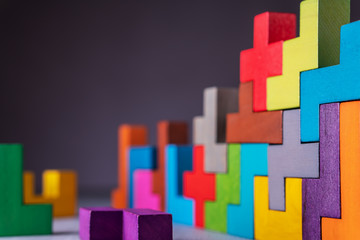 Geometric shapes on a wooden background.