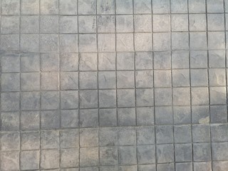 square shape stamp crete black color block pattern concrete material cement background