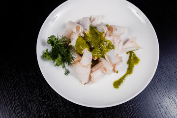 Lard. Strips of fat with copy space. Pork fat slices on a wooden plate, copy space
