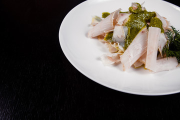 Lard. Strips of fat with copy space. Pork fat slices on a wooden plate, copy space