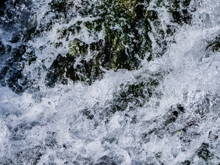 Close up waterfall of pure water in the mountains
