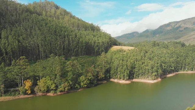 Aerial view beautiful nature with mountains and hills by Lake Mattupetty. Kerala State. Near the city of Munar.