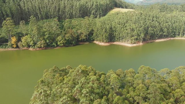 Aerial view beautiful nature with mountains and hills by Lake Mattupetty. Kerala State. Near the city of Munar.