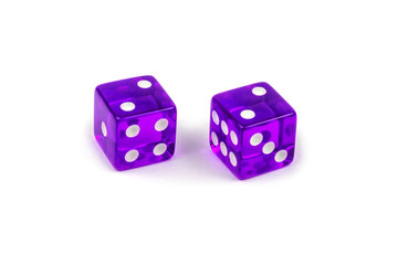 Two purple glass dice isolated on white background. Two and two.