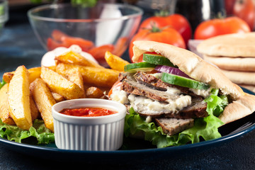 Doner kebab - fried minced meat  in pita bread