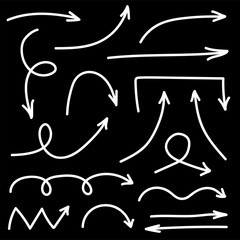 Set of white grunge hand drawn arrows isolated on black. Vector illustration