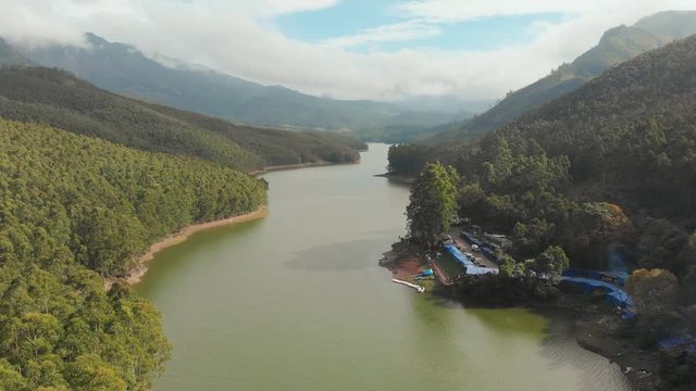 Aerial view beautiful nature with mountains and hills by Lake Mattupetty. Kerala State. Near the city of Munar.