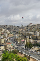 Amman city view with big Jordan flag and flagpole, Amman, Jordan