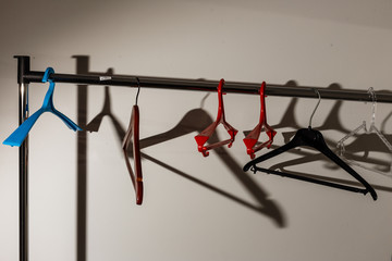 Stylish hallway interior with mirror and hanger stand