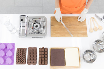 Woman making chocolate
