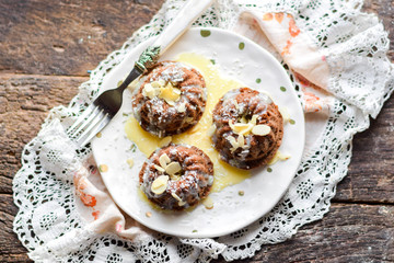 Chocolate muffins with almonds and condensed milk.