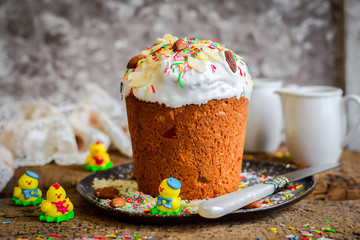 Easter cake with candied fruit, almonds and colored sprinkles.