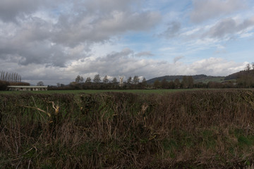 Dramatic winter skys in Britain late in the day or early morning countryside