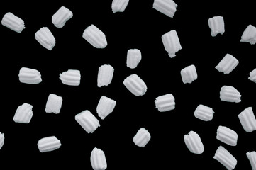 marshmallows on a black background