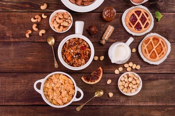 Tasty and useful breakfast with flakes, milk, nuts and dried fruits. The healthy food loading with energy