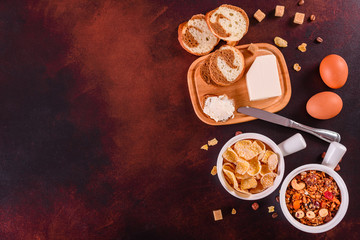 Tasty and useful breakfast with flakes, milk, nuts and dried fruits. The healthy food loading with energy