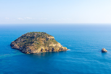 Fototapeta premium Aerial view of Portitxol Island in Javea, Spain