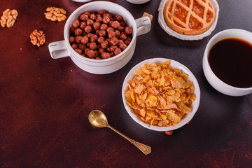 Tasty and useful breakfast with flakes, milk, nuts and dried fruits. The healthy food loading with energy