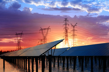 Pylon and photovoltaic panels in the evening